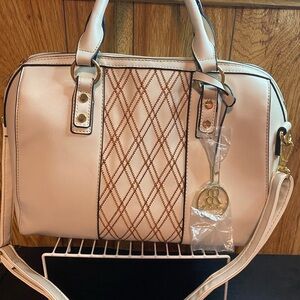 Elegant Cream Handbag with Gold Accents